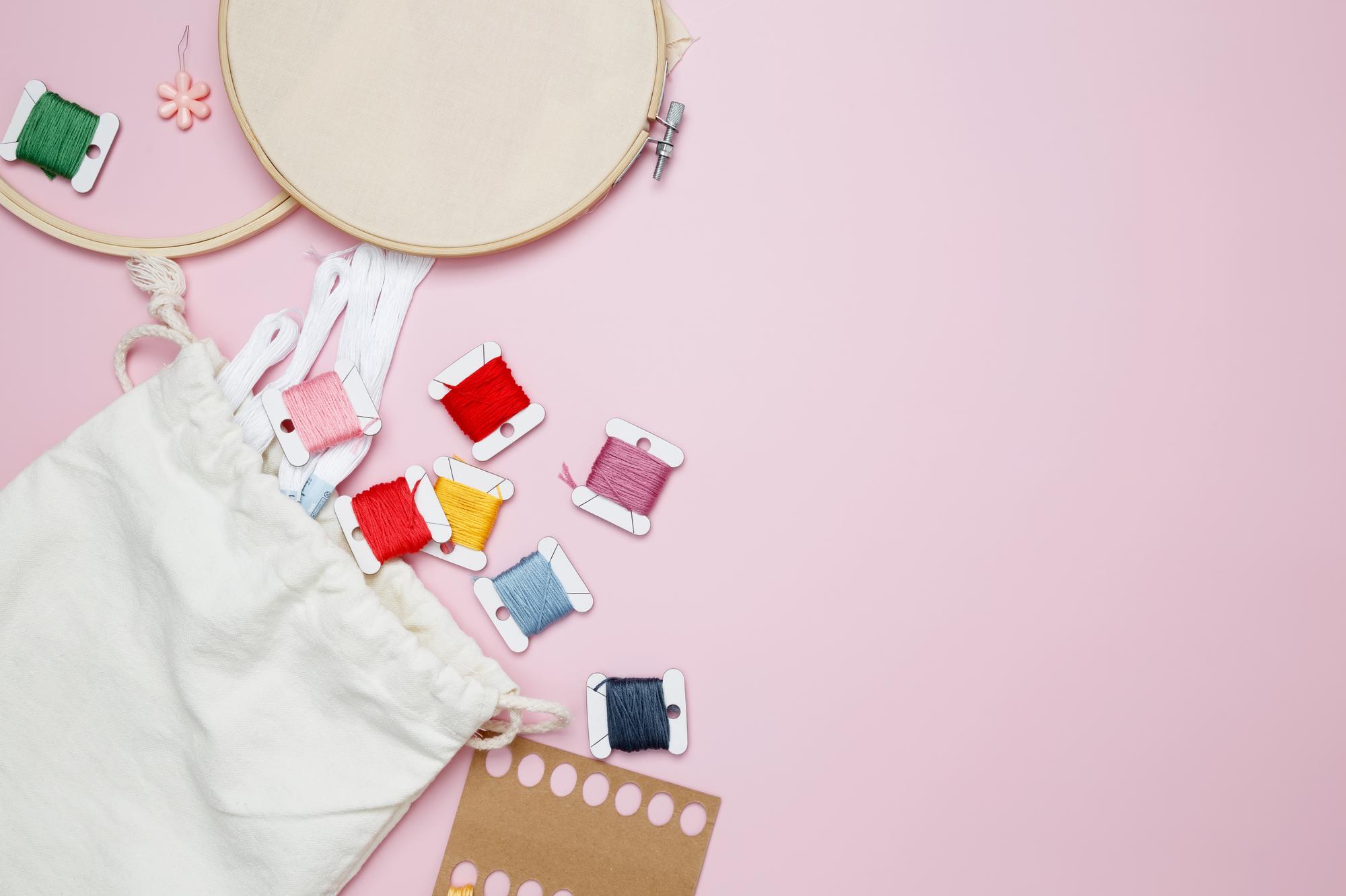 flatlay of embroidered swatches and tooling
